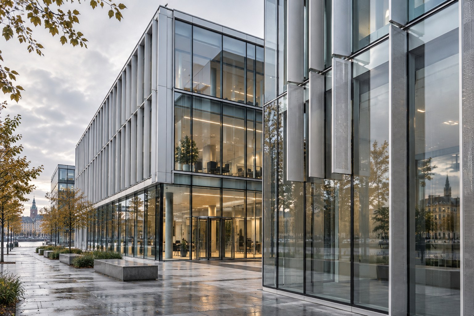 Concept office building with an aluminium and glass facade and vertical sun shading.